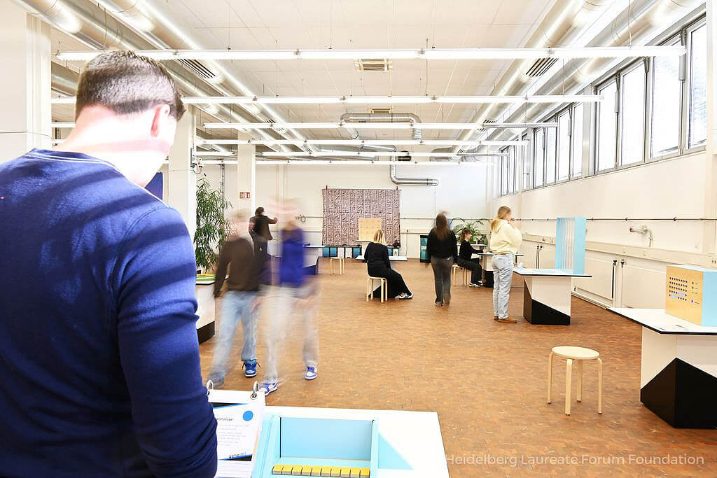 People in an exhibition space.