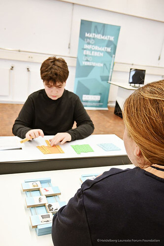 Two children at an interactive exhibit.